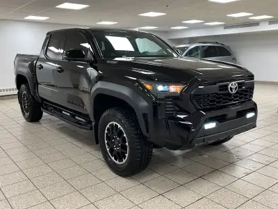 Engineered for drivers who want capability without compromising conscience, this 2025 Toyota Tacoma...