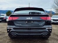 Presenting the 2024 Kia Forte5 GT in a sophisticated Black exterior with a smooth Front-Wheel Drive... (image 2)