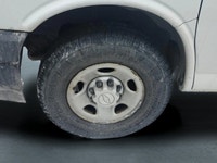 The 2017 Chevrolet Express Cargo Van in a classic white, rear-wheel drive design is tailored for tho... (image 8)