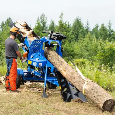 Self contained firewood processor, towable, gas motor. Canadian built, 5 year warranty. No more lift...