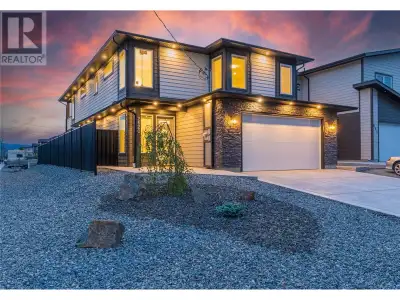 Brand new luxury home by Grace Contracting. Great location with river & mountain view close to airpo...