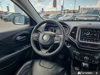 Experience rugged capability and everyday comfort with the *2022 Jeep Cherokee Trailhawk*, featuring... (image 9)