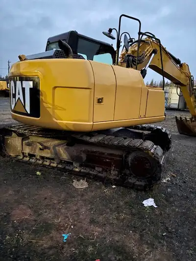 A real nice Cat 311F, 4200 hours. Comes with bucket and steel tracks with bolt on rubber. Buy, lease...