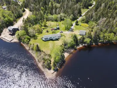 202 Amos Gillies Rd, New Harbour West, NS PropertyGuys Sign ID # 208668 Experience the beauty of wat...