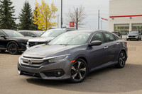This 2017 Honda Civic Sedan Touring brings together refined style, advanced technology, and reliable... (image 8)