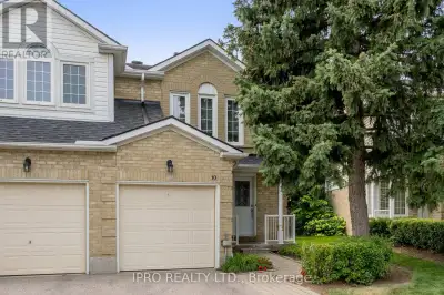 Welcome to this bright and spacious executive end-unit townhouse that feels just like a semi! Nestle...
