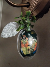 Ornament with green tea inside, decorated with heart