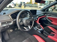 Heated front sport seats, heated steering wheel, and a 10.2-inch Acura Driver Information Interface... (image 8)