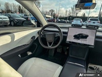 This Tesla Model 3 delivers a Electric engine powering this Automatic transmission. Wireless Phone C... (image 8)