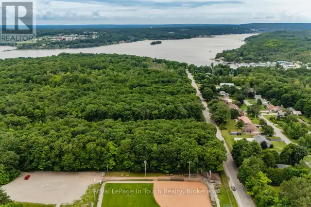 LOT 64 WHISPERING PINE CIRCLE Tiny, Ontario in Land for Sale in Oakville / Halton Region - Image 2
