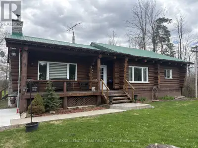 MOTIVATED SELLER !!!Stunning Log Home with privacy on a large parcel lot, just minutes from Cornwall...
