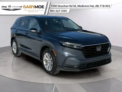 The 2023 Honda CR-V EX-L AWD in a sophisticated gray finish combines the reliability of all-wheel dr...