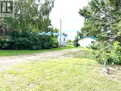 Looking For Your Perfect Little Gem? Here it is located on 2.57 acres in Gem, Alberta only a hop, sk...
