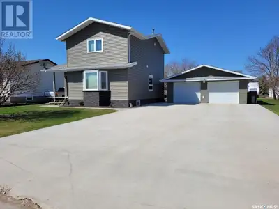 This house is located on a quiet street in the town of Carrot River. The home is two stories with a...