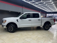 Experience the power and versatility of the 2022 Ford F-150 XLT 4WD SuperCrew, a white powerhouse bu... (image 1)