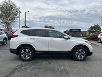 The 2019 Honda CR-V LX in stunning Platinum White Pearl combines versatility and efficiency, making... (image 3)