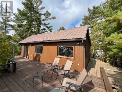 Have you ever dreamed about owning your own island? This is your opportunity. Just off the end of pi...