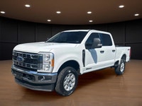 The 2023 Ford Super Duty F-250 SRW XLT in striking white comes equipped with a robust 4x4 drivetrain... (image 1)