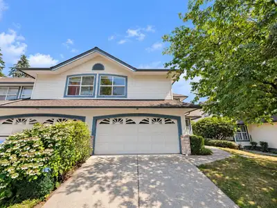 Move in ready and walking distance to everything, this fully renovated townhouse in Strawberry Hill...