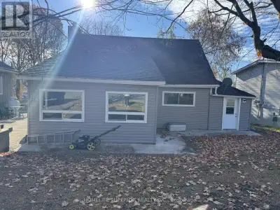 Cute & cozy 3 bedroom home features an open concept kitchen (2023) & large living room, upgraded flo...