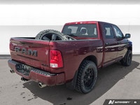 Experience the hardworking capability of this 2021 Ram 2500. Finished in bold Pearl Red with a Black... (image 4)