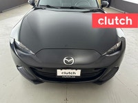Auto Dimming Rearview Mirror, Front Heated Seats, Automatic High Beams and more! Clutch is the large... (image 6)
