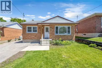 Exceptional opportunity to own a beautifully updated legal duplex raised bungalow in a peaceful, des...