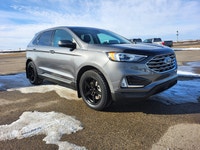 // EXCELLENT CONDITION! // This 2021 Ford Edge Titanium in Grey with a Black interior delivers upsca... (image 2)