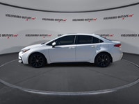 This used 2025 Toyota Corolla SE 2WD | Sunroof | Heated Steering Wheel is a smart hybrid sedan for d... (image 4)
