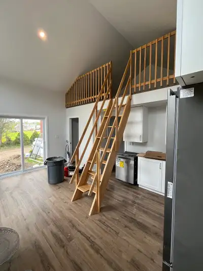 Fabulous brand-new loft apartment with deck available now.It's a completely renovated summer kitchen...