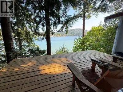Discover this oceanfront opportunity in Fulford Harbour. Offering beachfront, captivating ocean view...