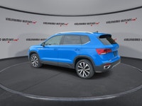 // ACCIDENT FREE!! // Finished in Blue with a Black interior, this 2023 Volkswagen Taos Comfortline... (image 5)