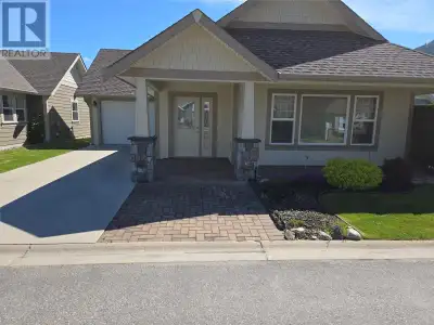 Indulge in the ultimate retirement lifestyle at this delightful 2 bed, 2 bath Rancher nestled in a p...