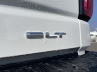 AMVIC Licensed Dealer The 2026 GMC Sierra 1500 SLT Crew Cab 4WD, finished in Summit White with a ref... (image 6)
