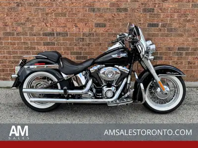 Beautiful DELUXE with Vance & Hines pipes, white wall tires, Willy G floor boards and brake pedal, W...