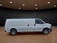 The 2020 Chevrolet Express Cargo Van 2500 Extended Wheelbase in a clean White finish, paired with re... (image 3)