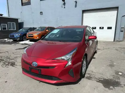 2018 Toyota Prius Découvrez votre prochain compagnon d'aventure! Cette vibrante Toyota Prius Rouge 2...