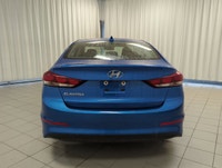 Finished in a confident Blue exterior with a clean Black interior, this pre-owned 2018 Hyundai Elant... (image 6)