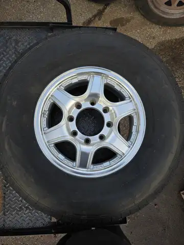 Save on new, old stock Alloy Rim and Tire Assemblies ST235/85R16 Load Range F Tires on 8 Bolt Alloy...