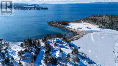 Seas The Day! Don't miss this oceanfront opportunity in the picturesque coastal community of Glen Ha...