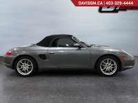 The 2003 Porsche Boxster captures the essence of pure roadster driving, a perfectly balanced mid-eng... (image 3)