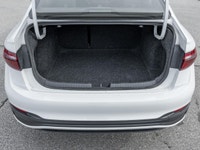 The 2024 Volkswagen Jetta Comfortline stands out in a refined White finish that complements its slee... (image 7)