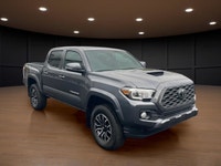 The 2023 Toyota Tacoma TRD Sport V6 in stunning gray is ready to tackle any terrain with its robust... (image 3)