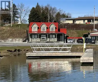 WATERFRONT DUPLEX with commercial unit on the main floor and one bedroom residential unit above, bot...