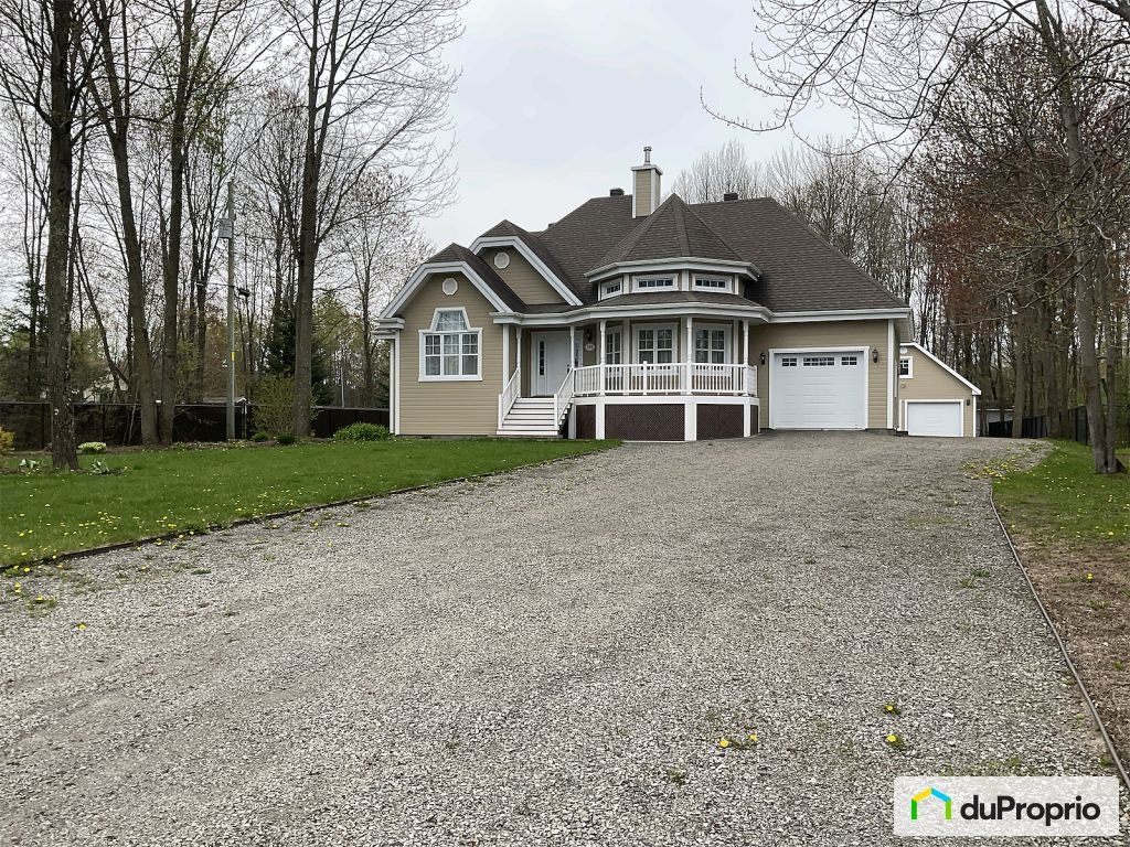 $799,000 - Bungalow for sale in St-Lin-Laurentides — photo 1