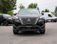 The 2023 Nissan Rogue AWD S in a sleek black hue complements its AWD capabilities, delivering a smoo... (image 1)