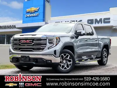 The 2023 GMC Sierra 1500 SLT Crew Cab Short Box 4-Wheel Drive in a refined gray finish offers except...