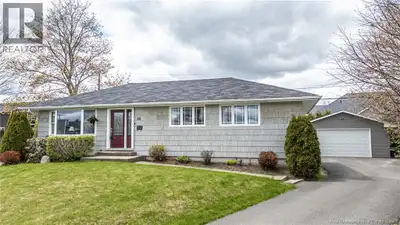 Welcome to this well-maintained bungalow offering a comfortable layout, finished lower level, detach...