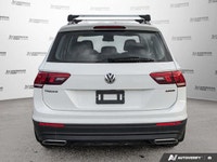 This Volkswagen Tiguan boasts a Intercooled Turbo Regular Unleaded I-4 2.0 L/121 engine powering thi... (image 4)