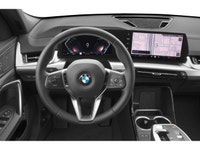 The 2025 BMW X2 xDrive28i Sports Activity Coupe, a stunning model in sleek black, features an advanc... (image 3)